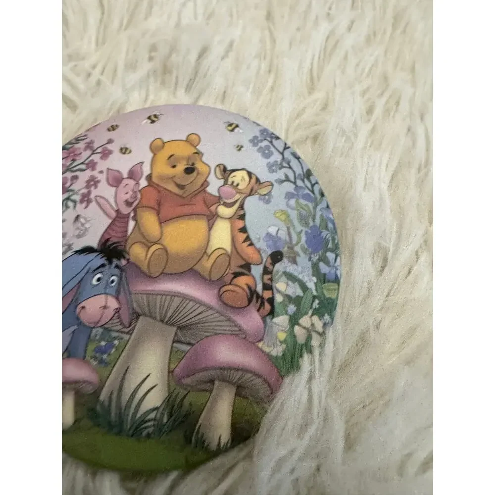 Winnie the Pooh compact mirror with Pooh, Tigger, Piglet, & Eeyore on mushrooms